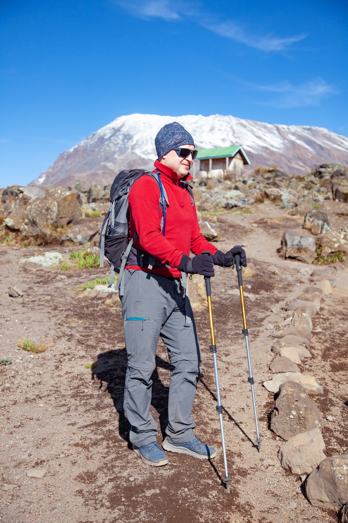 Male backpacker on the trek to Kilimanjaro mountain